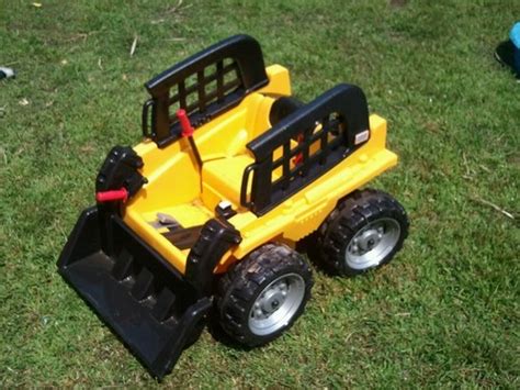 kids skid steer power wheels|bobcat skid steer solid tires.